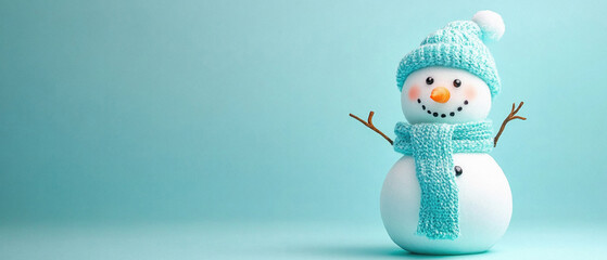 A blue snowman with a blue hat and scarf stands on a blue background. The snowman is smiling and he is happy