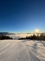 Sonnenaufgang über den Wolken, Österreich