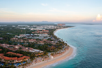Obraz premium Aerial View of Resorts and Jungle at Sunrise in Punta Cana Dominican Republic