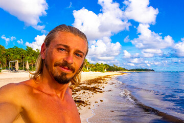 Male tourist Travelling man taking selfie Playa del Carmen Mexico.