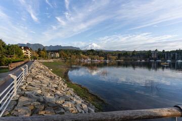 Fototapeta premium Pucon viewpoint of volcano by Lake Villarrica, panoramic shot on sunny morning