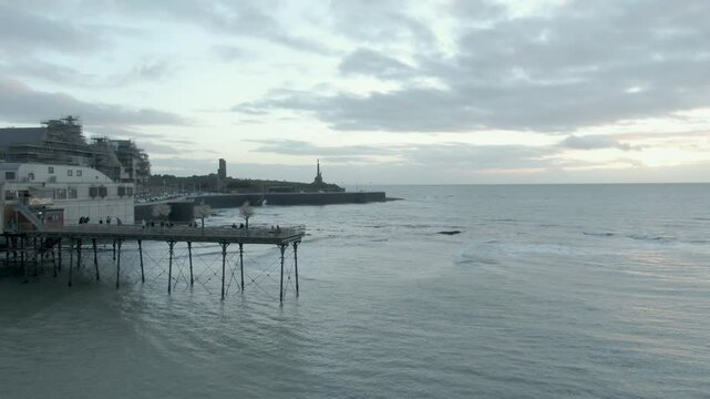 Aberystwyth Seafront pier and Shoreline Wales Aerial low