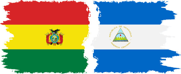 Obraz premium Nicaragua and Bolivia grunge flags connection, vector