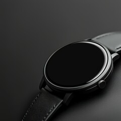 Modern black wristwatch with a sleek design on a dark background.