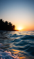 Golden hour over ocean waves and palms