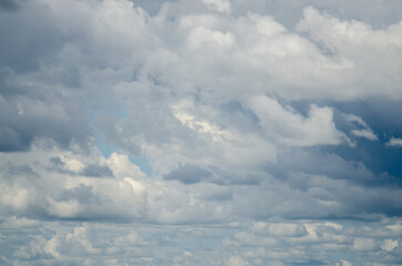 Fototapeta premium Large clouds against a light sky