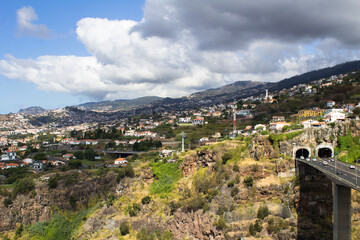 Top view of the city and bridge on a summer day. Funchal. Madeira. Portugal.
