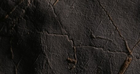 Close-up of Textured Rock Surface with Natural Cracks