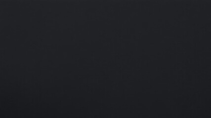 Fototapeta premium Black paper with rough texture, perfect for backgrounds or overlays, material, space