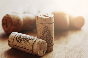 Close-Up of Wine Corks on Wooden Surface in Warm Lighting