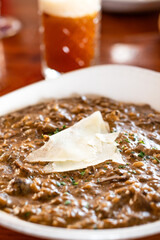 Mushroom Risotto with parmesan cheese served in restaurant