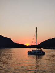 a beautiful ship is sailing in the blue sea