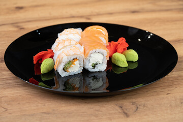 delicious traditional Japanese sushi and rolls on a plate