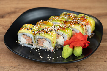 delicious traditional Japanese sushi and rolls on a plate