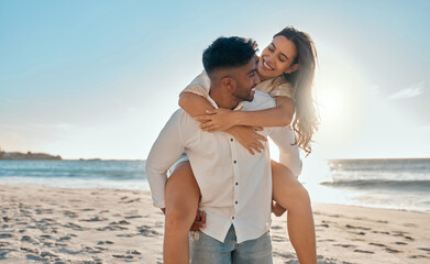 Piggyback, happy and couple by beach on holiday, getaway or vacation with travel together. Smile,...