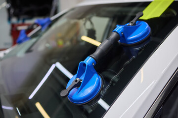 Installing windshield on a car with automotive design