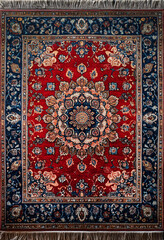 Persian carpet with red and blue floral medallion design