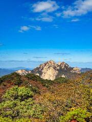 Fototapeta premium Fall Colors on Bukhansan Mountain Peaks, Seoul, South Korea