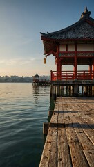 Fototapeta premium Peaceful Waterfront View with Traditional Structures and Clear Skies