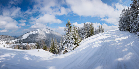 beautiful skiing area Stumpfling mountain, tracks in powder snow. Alpine landscape upper bavaria