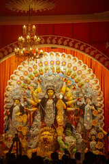 A detailed Durga Puja idol showcasing vibrant colors and intricate decoration, symbolizing strength...