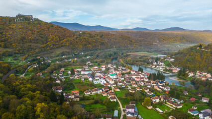 Fototapeta premium Kulen Vakuf and the ancient fortress Stari Grad Ostrovica, viewed from the air, reveal a captivating blend of history and natural beauty in Bosnia and Herzegovina. The aerial perspective captures