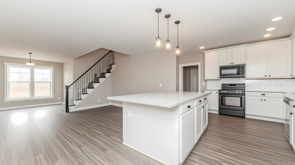 Spacious open kitchen with minimalist handleless cabinets, matte black accents, and an oversized island perfect for family gatherings