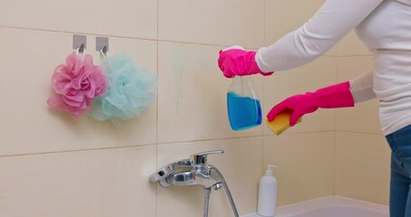 Cleaning the bathroom with colorful loofahs and various detergents is a delightful task - Powered by Adobe