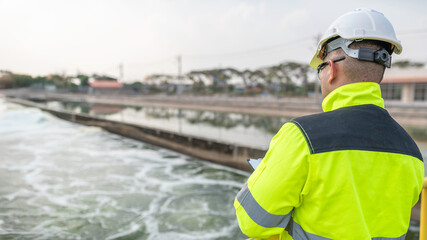 Environmental engineers work at wastewater treatment plants,Water supply engineering working at Water recycling plant for reuse