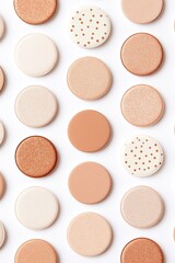 Obraz premium Colorful round makeup products arranged in uniform pattern, varying shades and textures, beauty and cosmetics