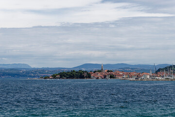 Fototapeta premium View on the Izola city from sea Adriatic coast.