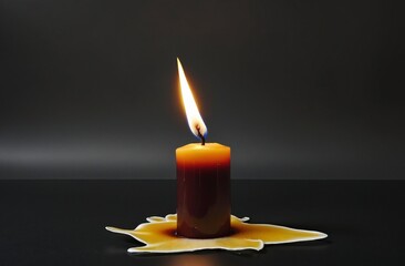 A Solemn Tribute: Illuminating the Memory of Holocaust Victims with a Flickering Candle
