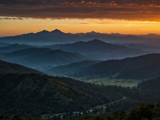 Fototapeta premium Sunrise illuminating the mountains.