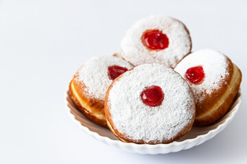 Tasty donuts with jam  - Hanukkah celebration concept	
