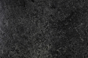 Fototapeta premium Smooth and polished black stone.