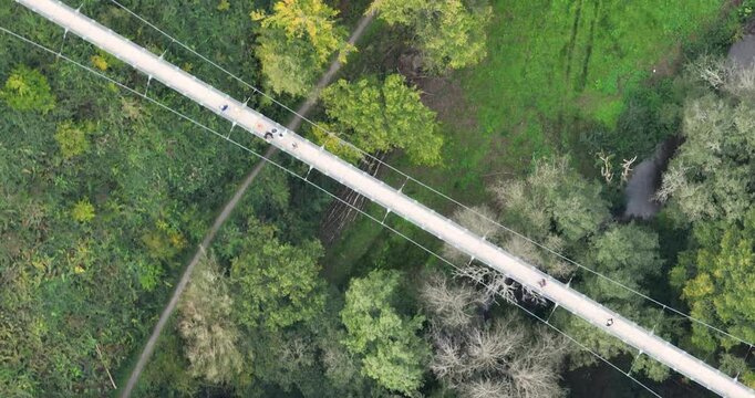 Aerial drone video of The Geierlay Suspension Bridge, pedestrians bridge, spans the Morsdorfer Bachtal. Adventure destination.