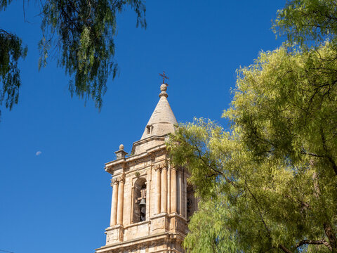Bell tower and castle of the Cordoba town of Luque (Spain) on a sunny autumn morning