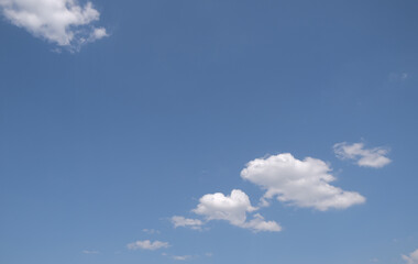 a soft blue sky with clouds