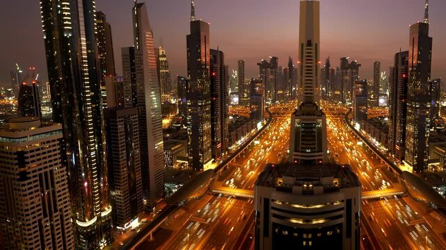 View futuristic urban cityscape with highrise buildings and modern infrastructure at dusk