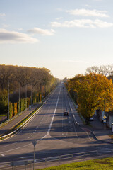 a road going into the distance among autumn trees in Chernigov
