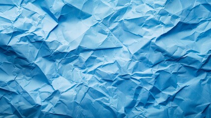 Sky blue paper with creases and folds for a simple, artistic background