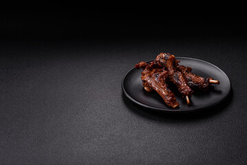Ribs or rack of beef baked on the grill with salt, spices and herbs