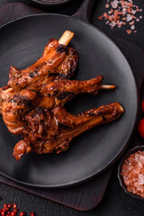 Ribs or rack of beef baked on the grill with salt, spices and herbs