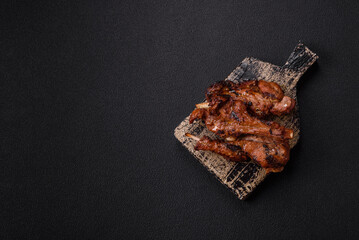 Ribs or rack of beef baked on the grill with salt, spices and herbs