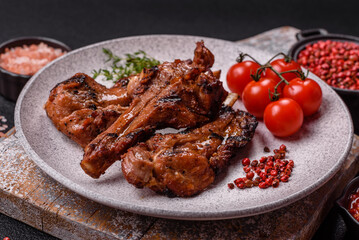 Ribs or rack of beef baked on the grill with salt, spices and herbs