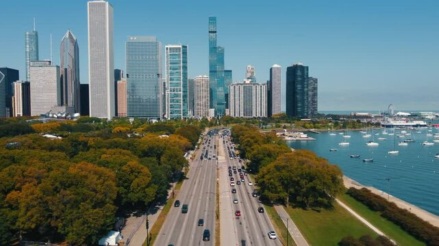 Scenic view of Chicago lakefront S Dusable Lk Shr Dr. The central highway is loaded with traffic.