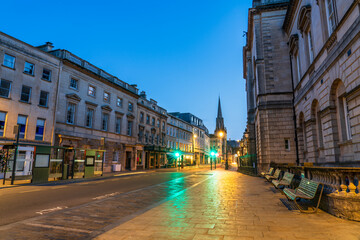 Obraz premium Bath city high street overlooking tower of St. Michael's Church captured at dawn. UK