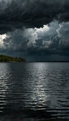 Fototapeta premium Storm clouds rolling over a calm lake, creating dramatic contrast.