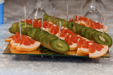 Colorful Fruit Platter Featuring Grapefruit and Kiwi Slices