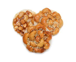 Honey bars with peanuts, sesame and sunflower seeds isolated